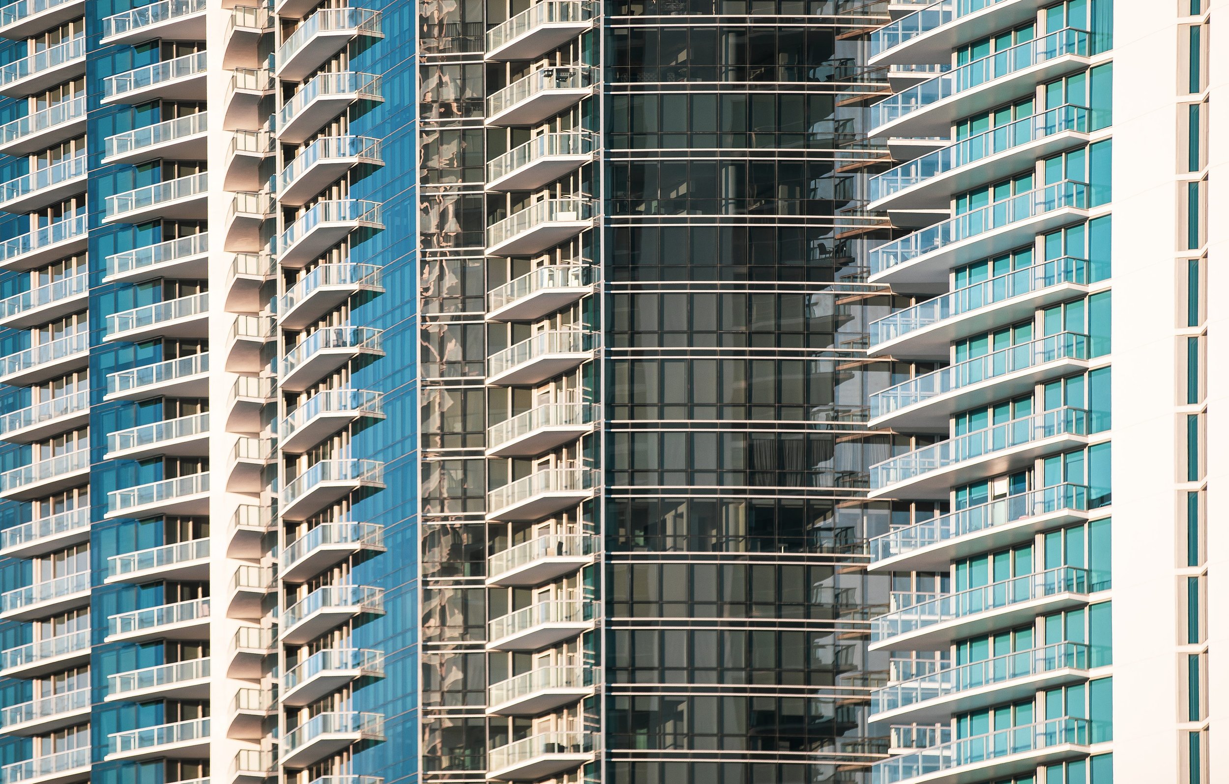 Glass tower balconies - facade detail - photography by Studio Basel Media