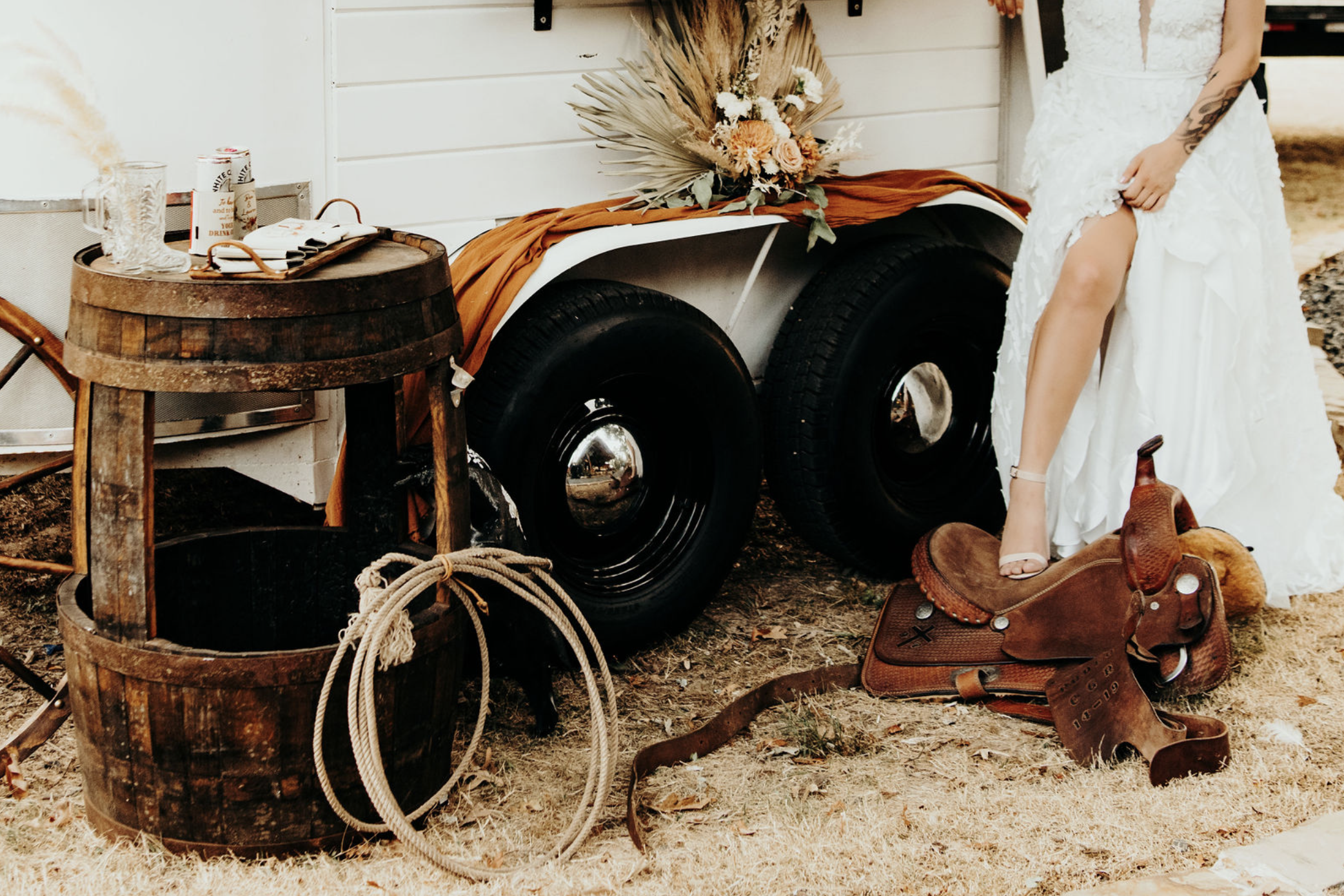 Wild Pony Express Bar western wedding setup at sunset