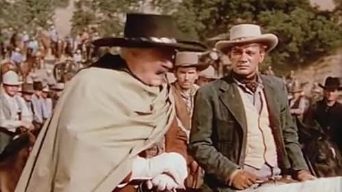 Lionel Barrymore as Senator McCanles mounted on horseback with his mob of armed followers in the 1946 western Duel in the Sun