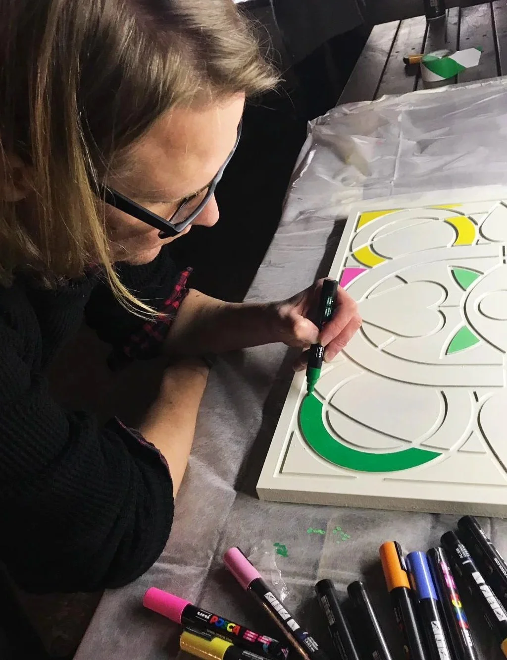 Barney drawing with Posca paint markers at a Design Manchester event in 2019