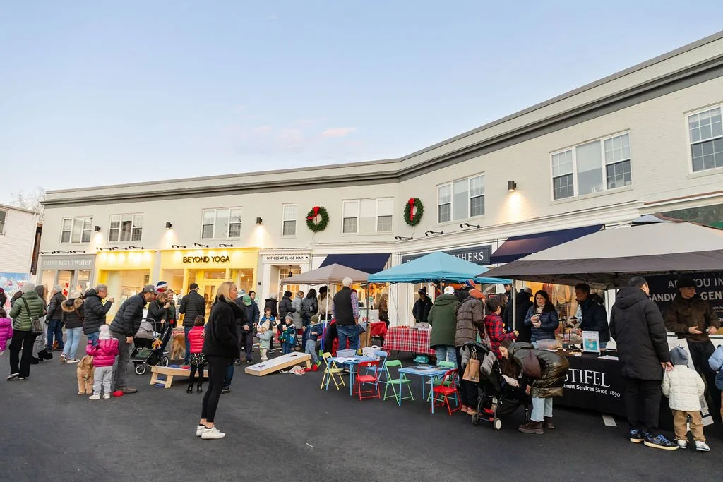 Holiday vendors in the Elm + Main Lot