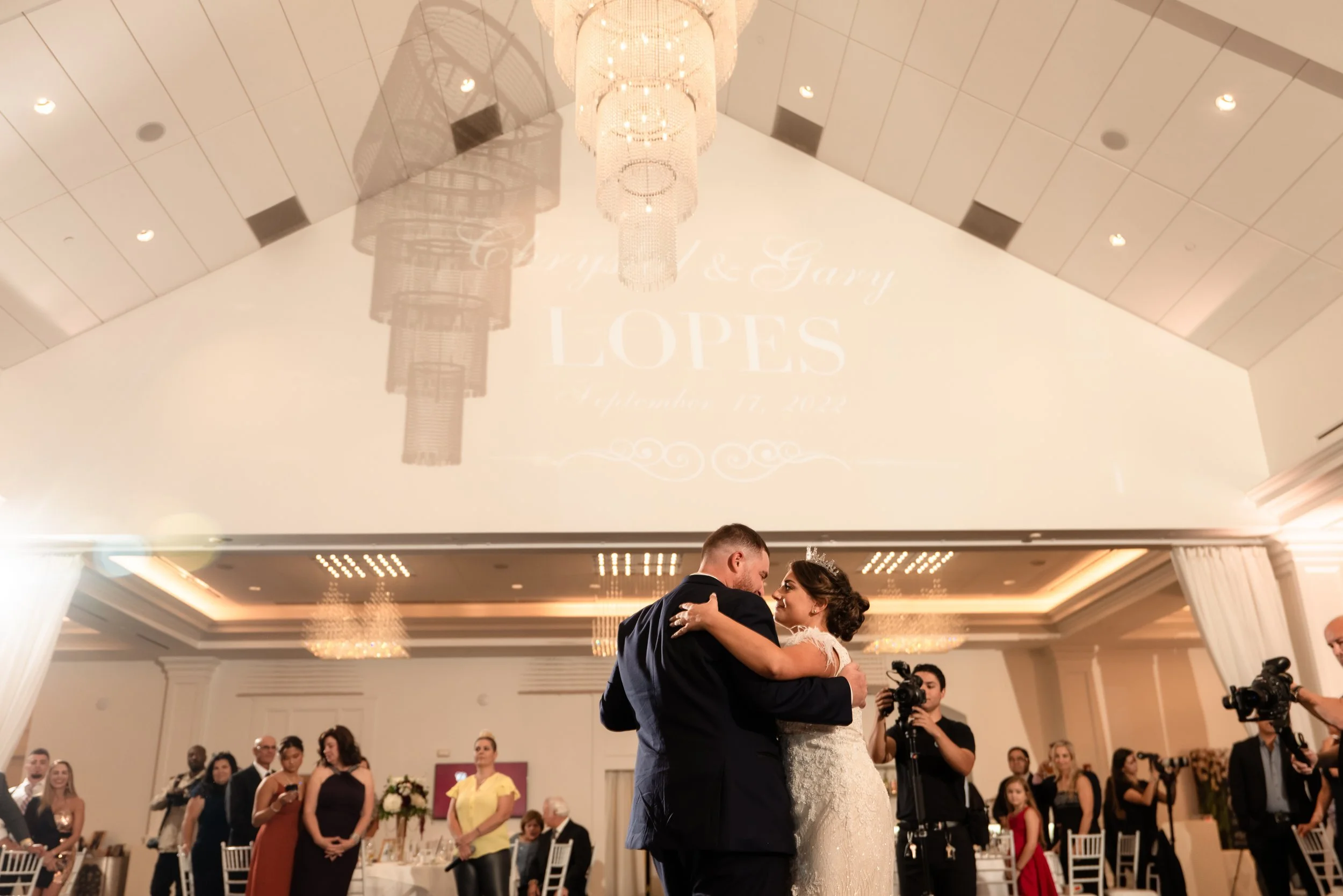 First dance under crystal chandeliers in the Lakeview Pavilion ballroom, Foxborough, Massachusetts