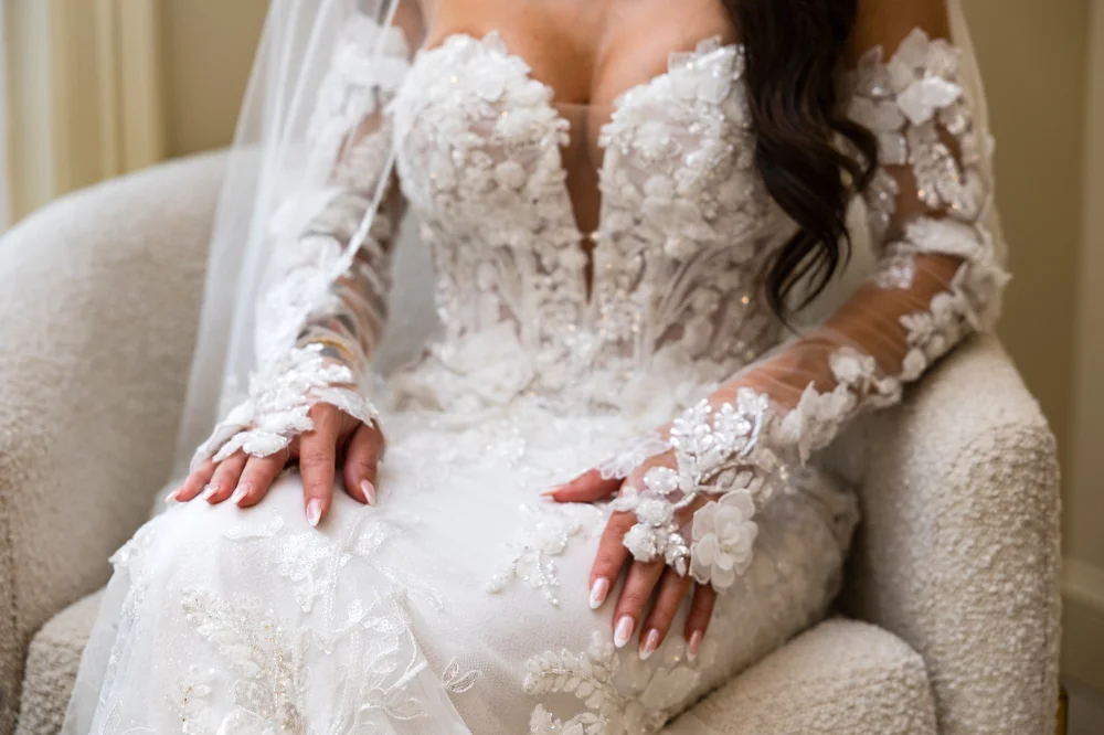 Anthony's Ocean View wedding photographer, New Haven, CT — detail of 3D floral lace wedding dress bodice and sleeves