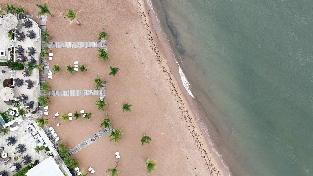 Anthony's Ocean View wedding videographer, New Haven, CT — top-down aerial view of the beachfront boardwalks and waterfront terrace