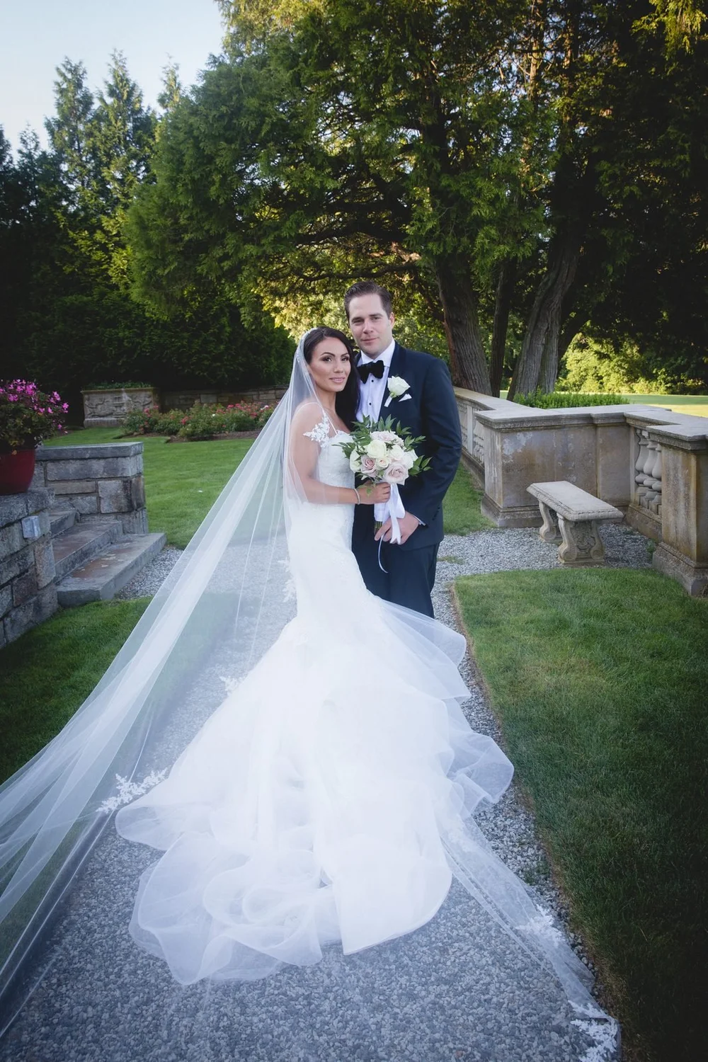 Aldrich Mansion wedding photographer, Warwick, RI — couple portrait on the gravel garden path beside the limestone balustrade