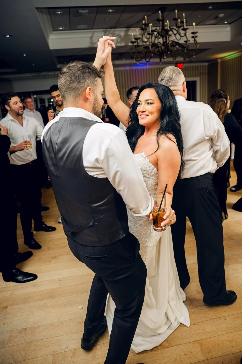 Beauport Hotel wedding videographer, Gloucester, MA — groom spinning the bride on the ballroom dance floor