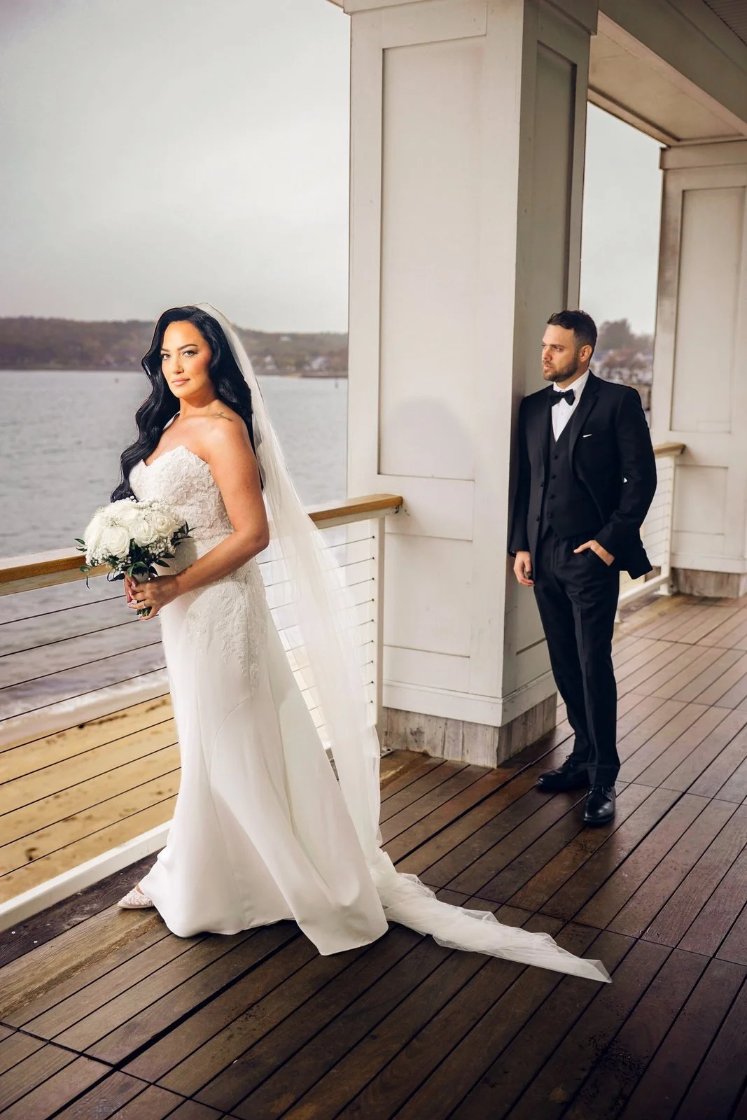 Beauport Hotel wedding photographer, Gloucester, MA — first look on the oceanfront deck overlooking Gloucester Harbor