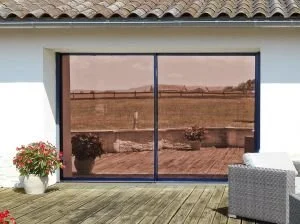 Amber 35 Low E window film showing a warm reflective finish on patio doors
