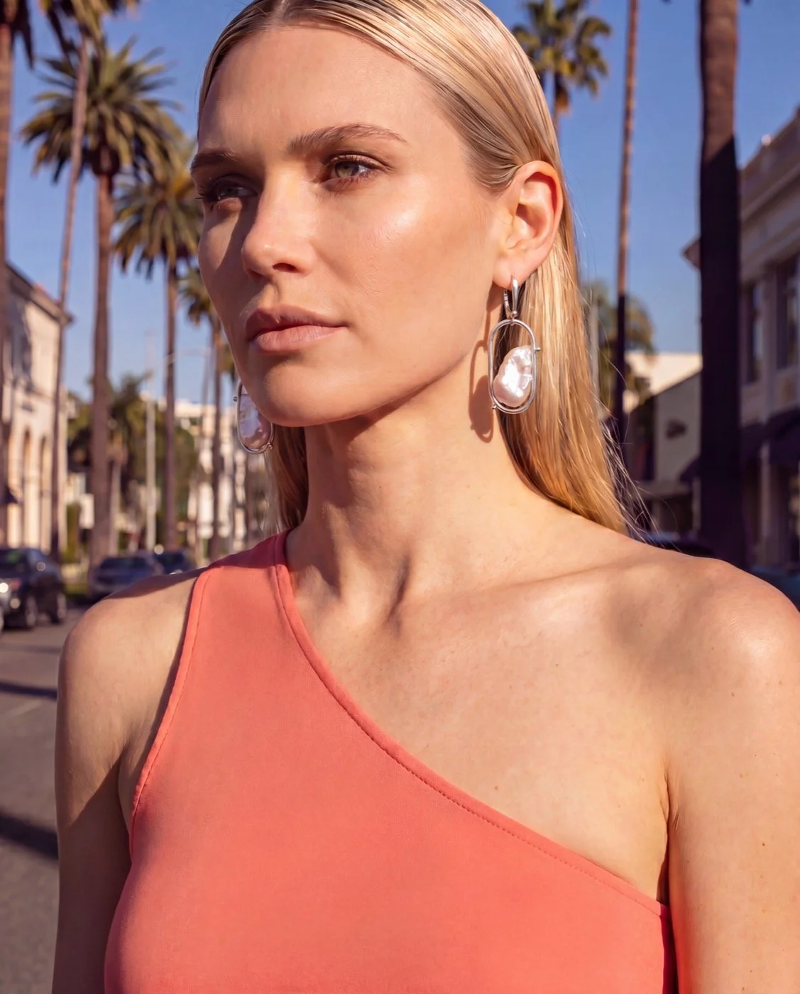 Dew Drops earrings worn on model