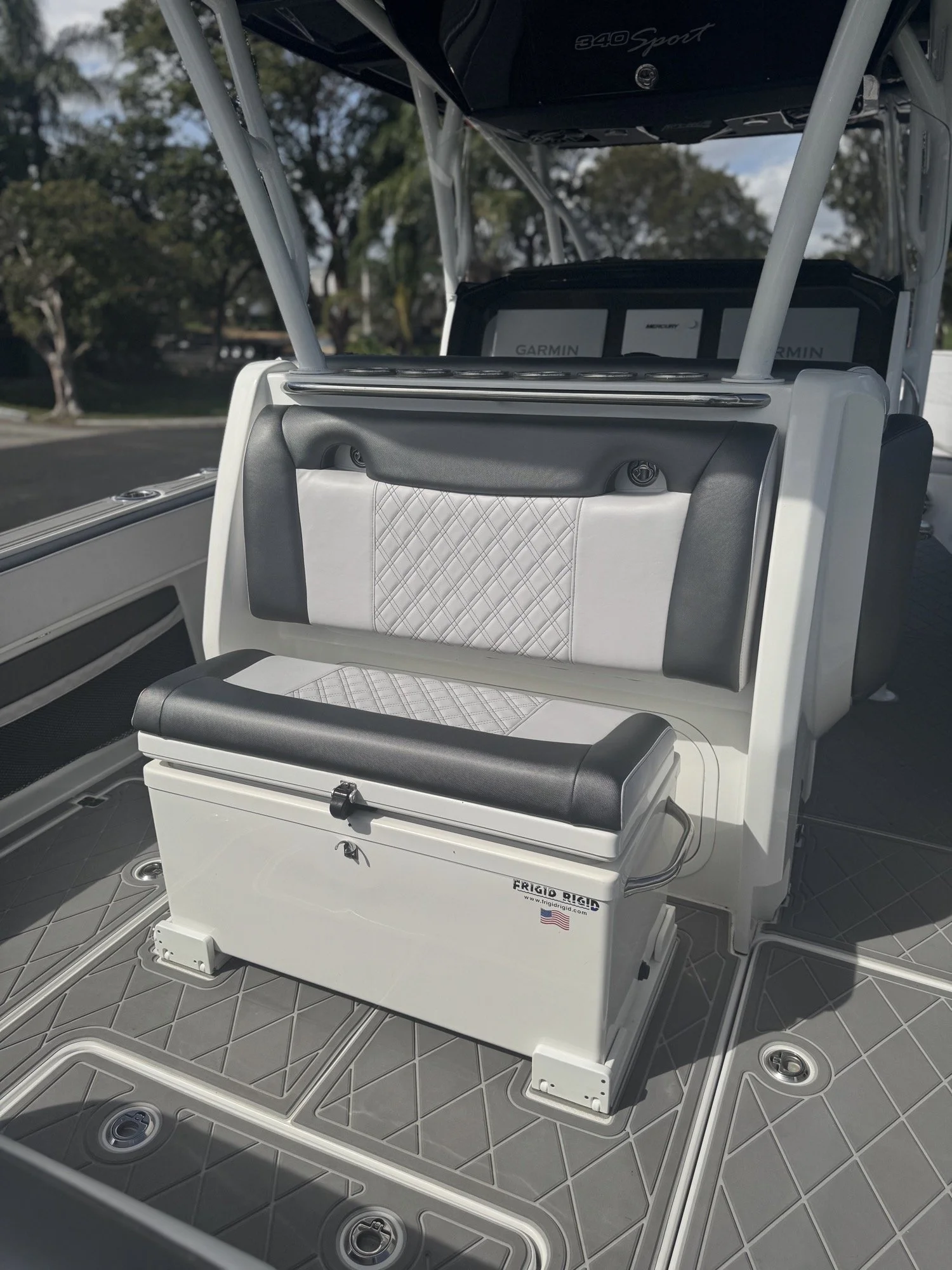 Nor-Tech 340 Sport aft lounge and cooler seat in white diamond-stitch vinyl with charcoal bolsters, rebuilt by Rivers Refined