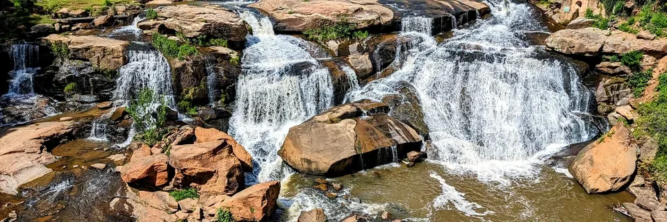 Water cascades over rocks at Falls Park on the Reedy in Greenville.