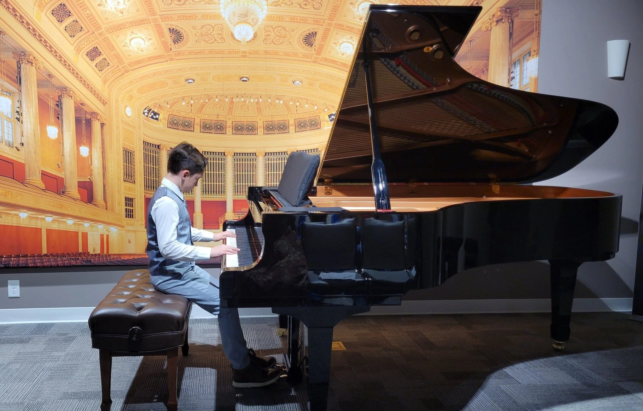 Heart Beats student performing at a piano recital