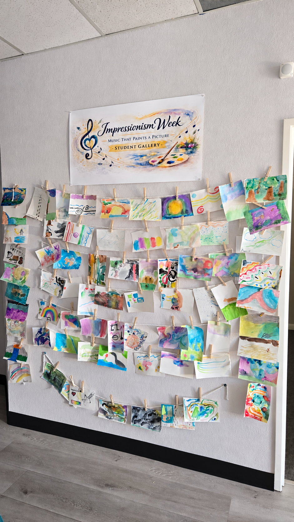 Student artwork displayed at the Heart Beats Impressionist art gallery