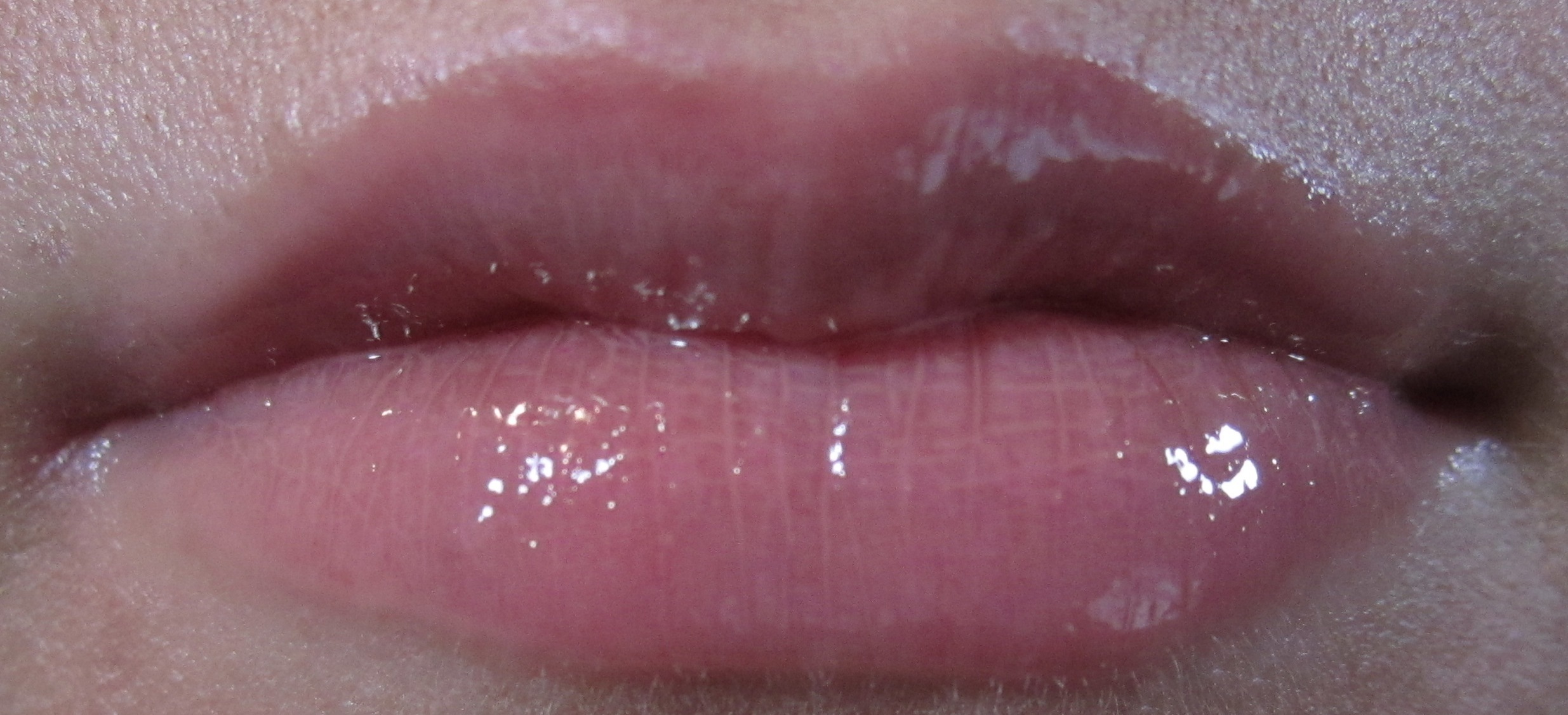 Buxom Lip Gloss in White Russian.