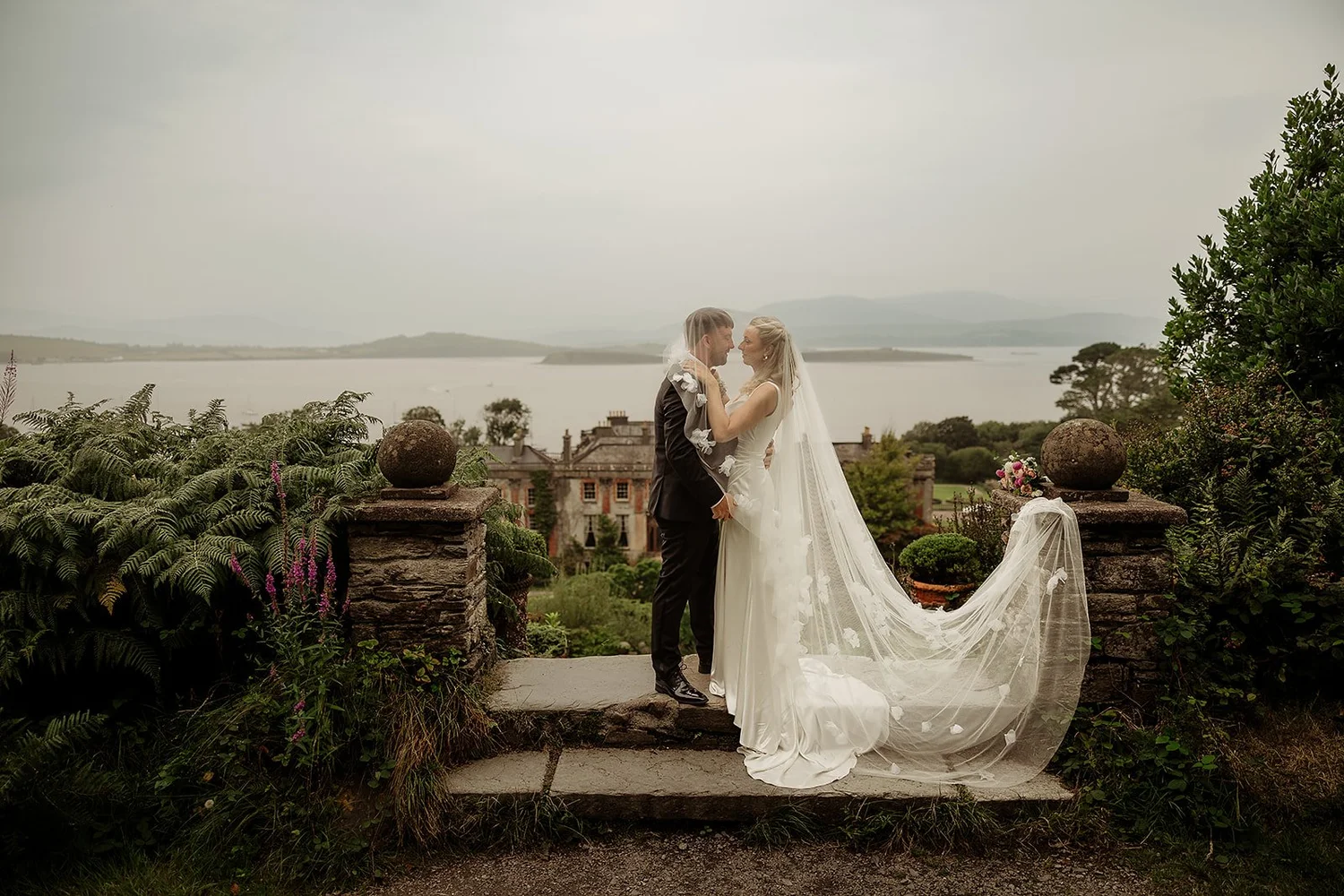 Ellen and Aaron on the terrace above Bantry House, with Bantry Bay behind them