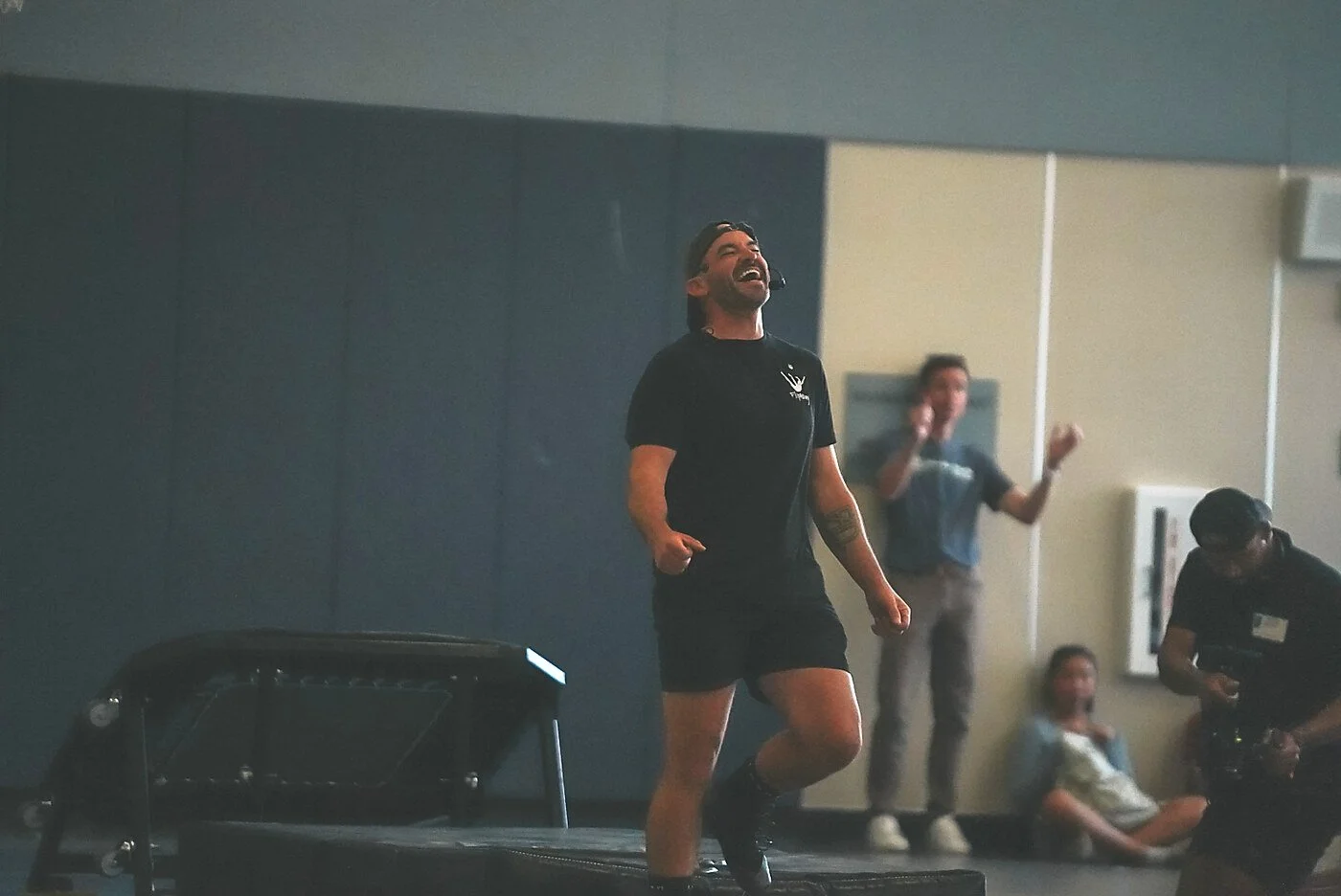 Pat Graves celebrating a landed trick during a live school performance