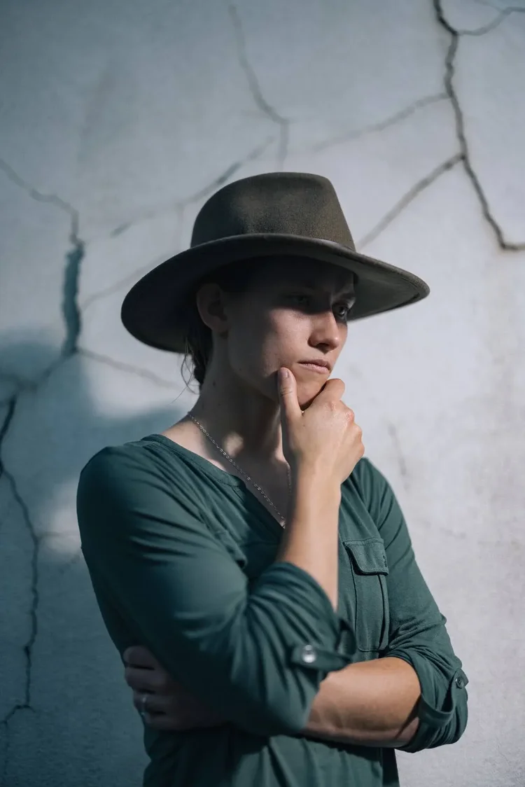 Editorial portrait of cyclocross athlete Hannah Arensman in a hat, photographed in Morganton, NC for The Telegraph