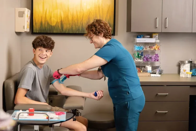 Adolescent clinical trial blood sample collection by Jack Robert Photo