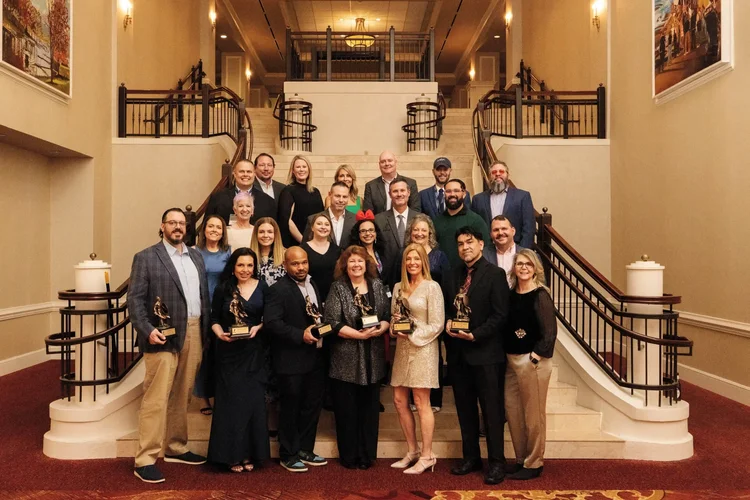 Corporate team group photo on a staircase in Greenville SC by Jack Robert Photo