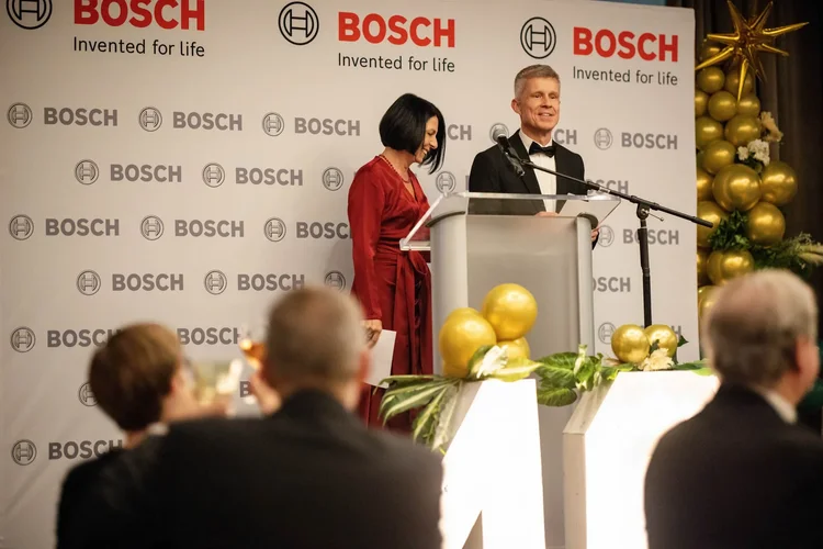 Corporate keynote speaker at a podium during a Greenville SC event by Jack Robert Photo