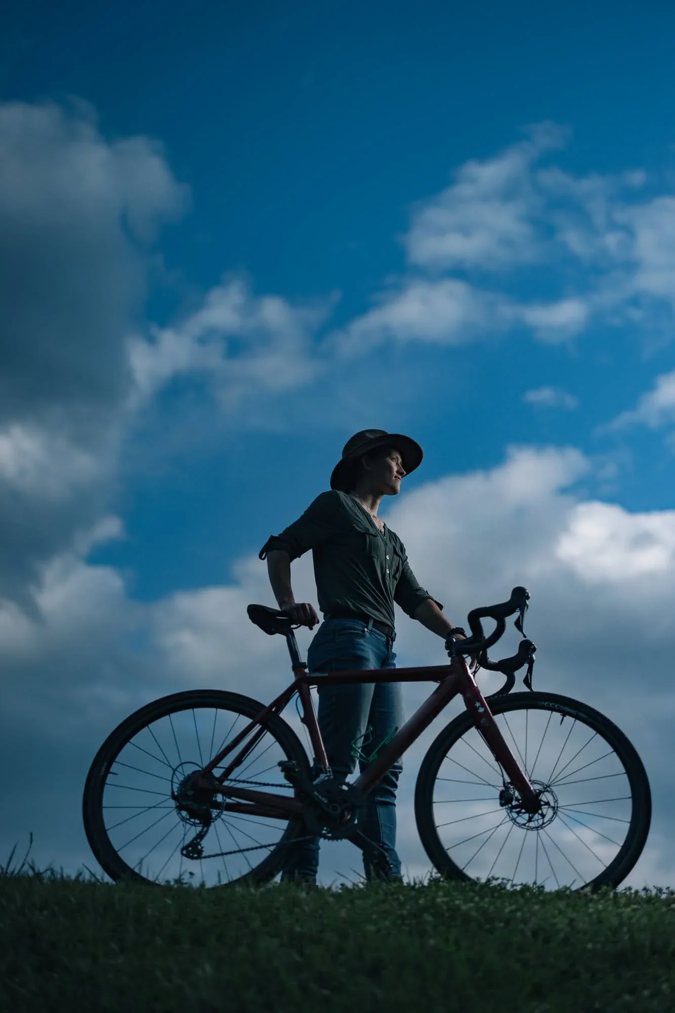 Silhouette of Hannah Arensman's cyclocross bike against the sky, conceptual editorial portrait, Morganton NC by Jack Robert
