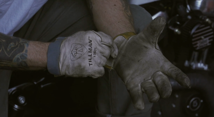 Gloved hands at work