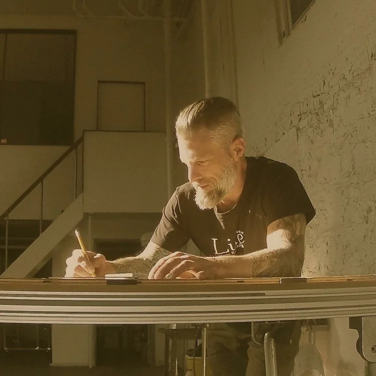 At the drawing table