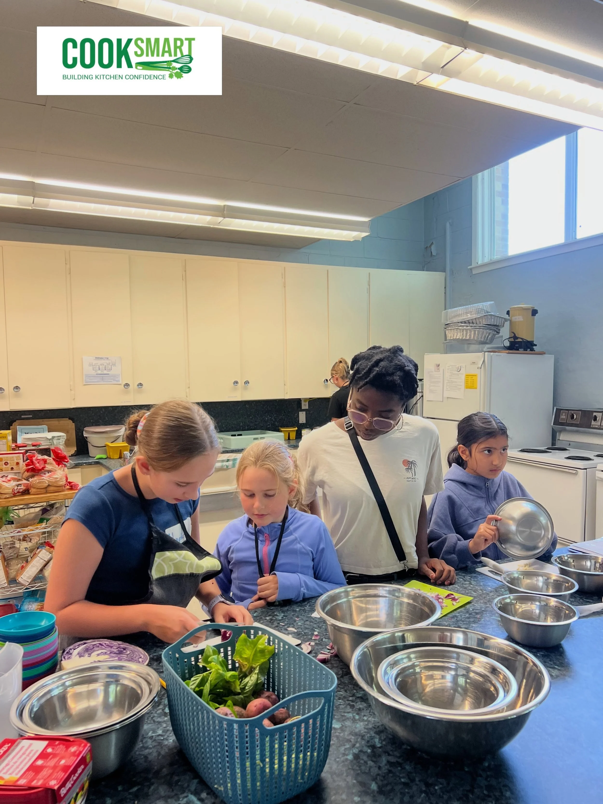 Students actively cooking in the COOKSMART Lab