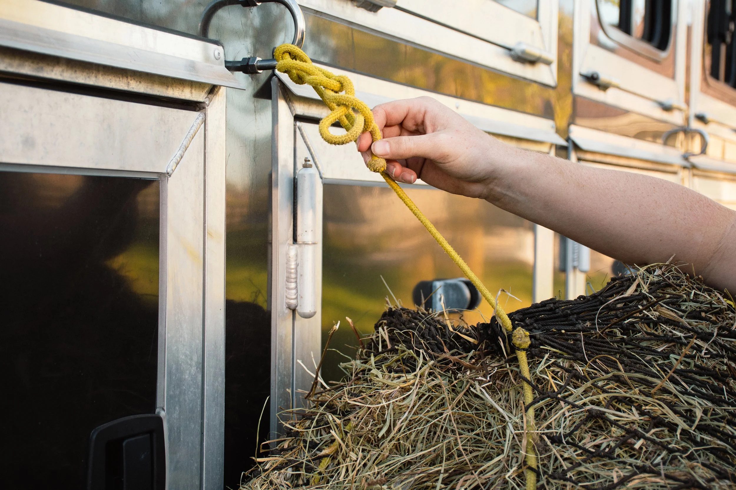 Texas Haynet hay net filled trailer-side at a show