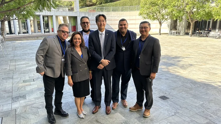 Development Corporation CEO meeting with attorney over lunch