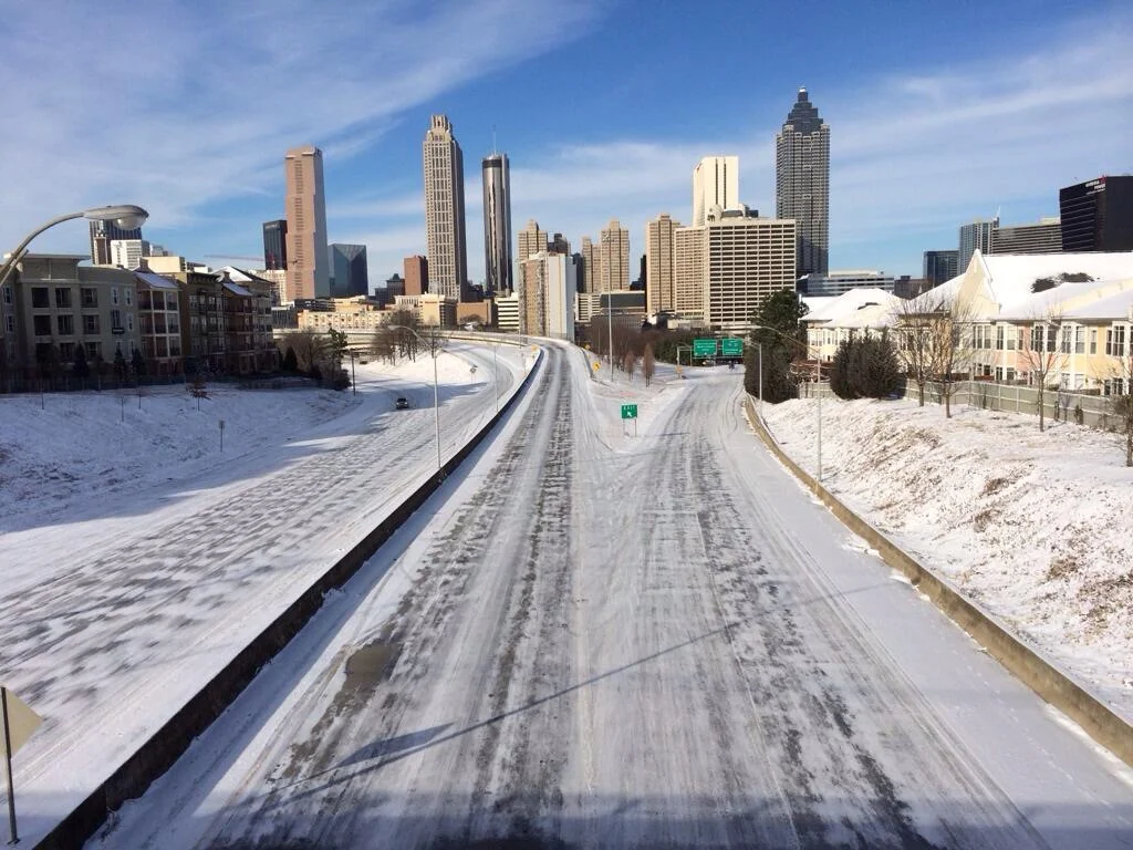 The walking dead poster VS the actual Atlanta highway yesterday
