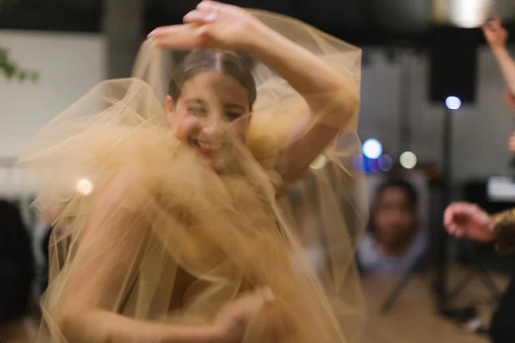 A bride smiles on her wedding day.