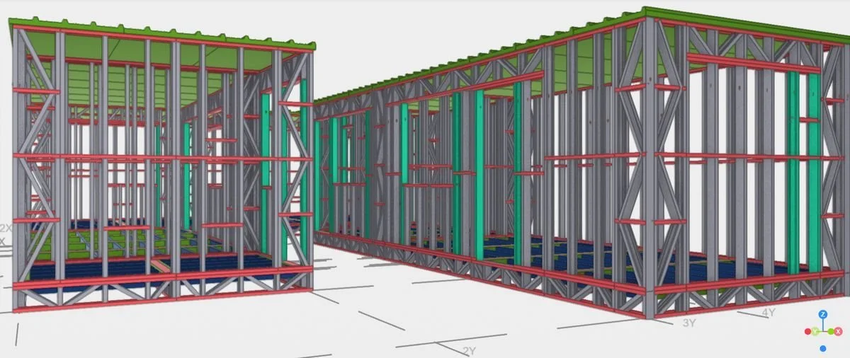 Módulos de oficinas con perfiles estructurales y diagonales visibles.