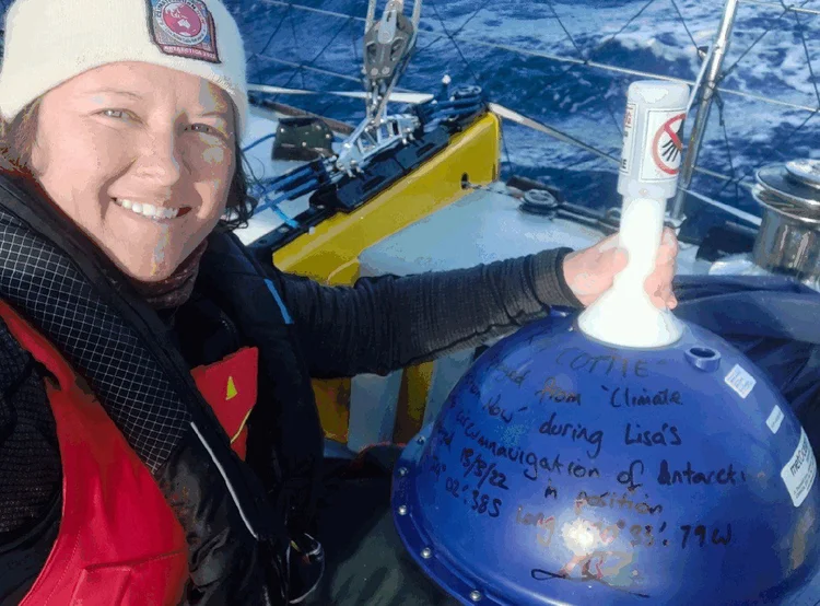 Lisa deploying a weather drifter buoy