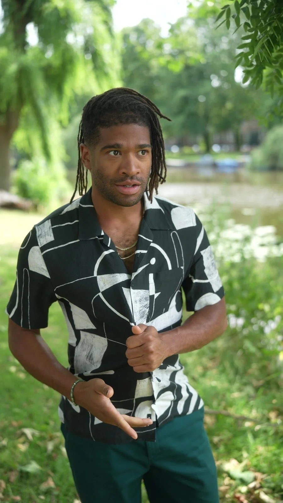 Darius Christian outdoors beside an Amsterdam canal