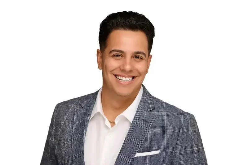 Professional studio headshot of a man