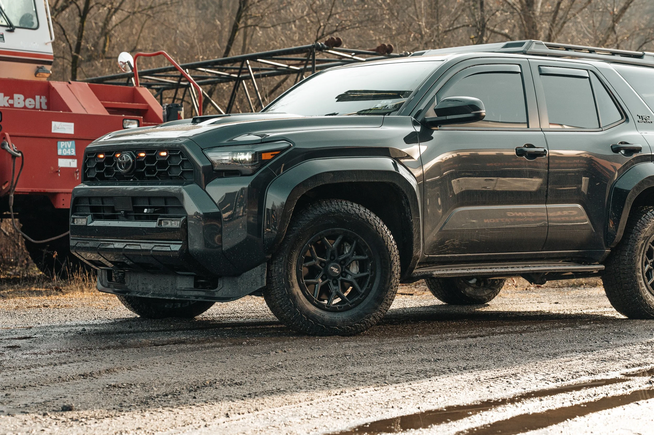 RockTrix RT107 17 inch wheels and Cooper Discoverer Road and Trail 265/70R17 all-terrain tires installed on Ian Jones' 2025 Toyota 4Runner TRD Sport build, showing real-world 6th gen 4Runner wheel and tire fitment.