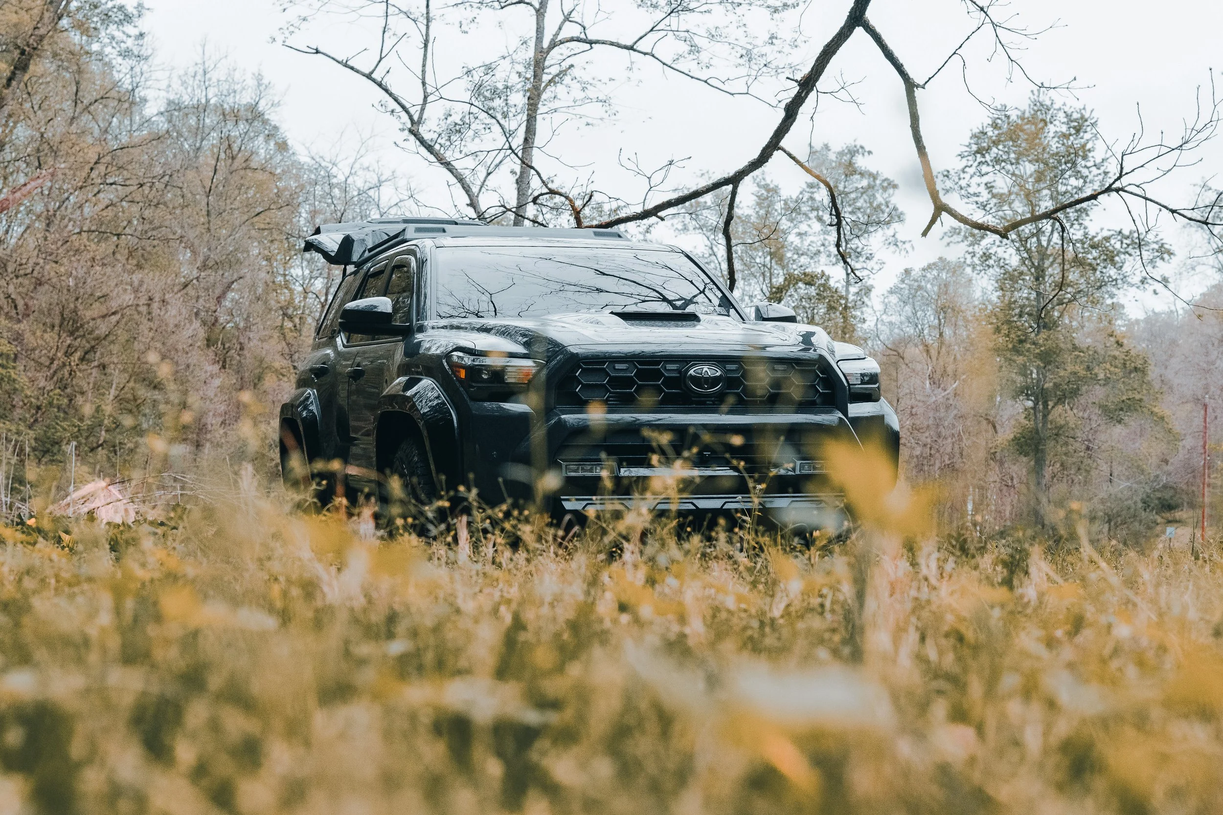 Ian Jones' 2025 Toyota 4Runner TRD Sport build in Underground gray with OEM+ exterior mods, Kuat Piston Pro X bike rack setup, 6th gen 4Runner accessories, and real-world build photography for ISJDesigns.