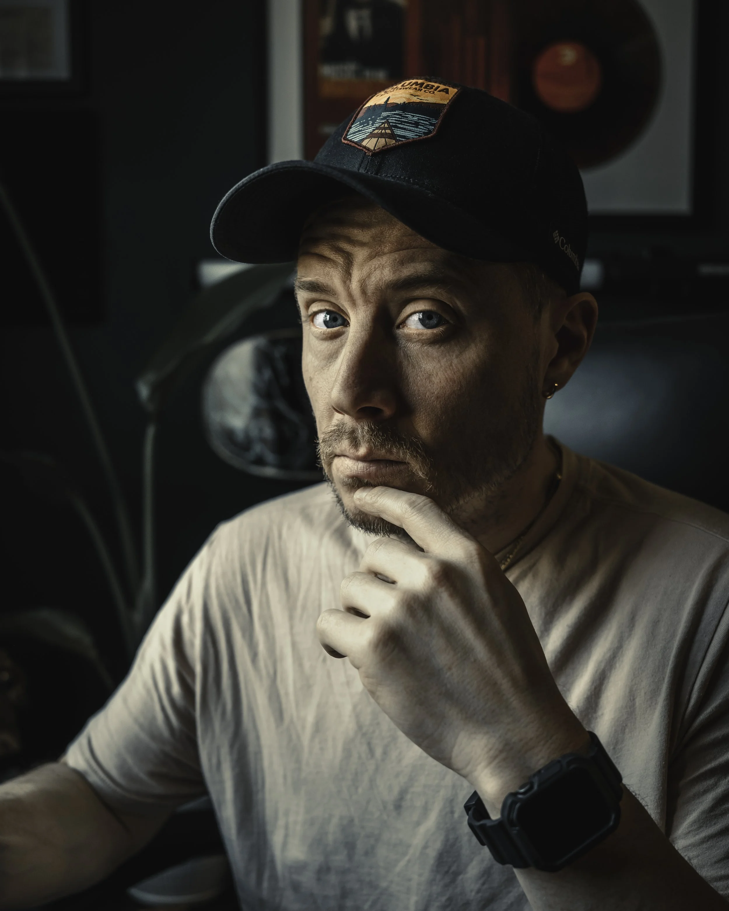 Editorial portrait of Ian Jones wearing a black hat for his Swagger Magazine interview about growing Instagram the right way.