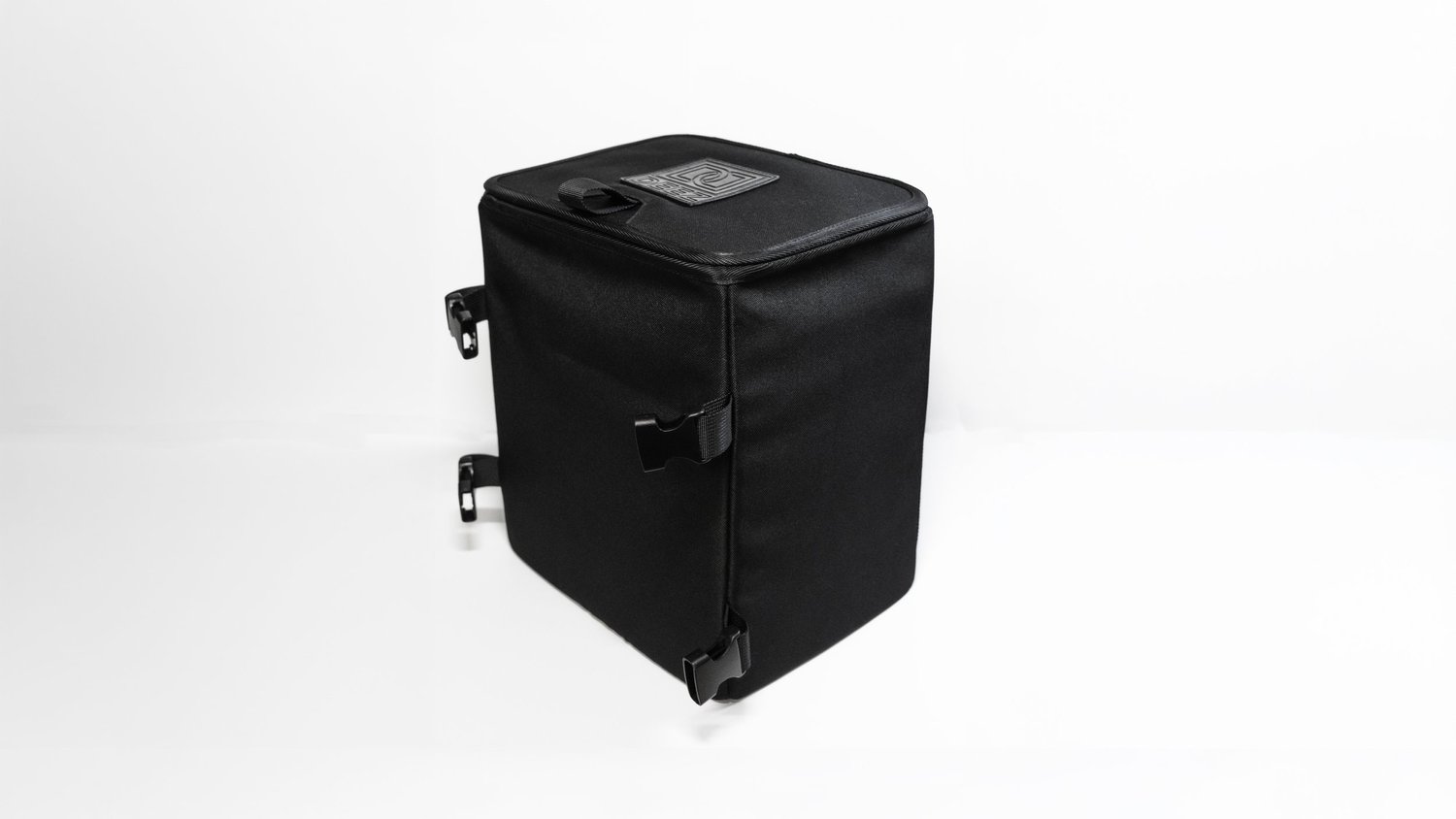 Three-quarter view of the black Double Deez Goodz vehicle trash can on white, ecommerce product photography by Ian Jones of ISJDESIGNS.