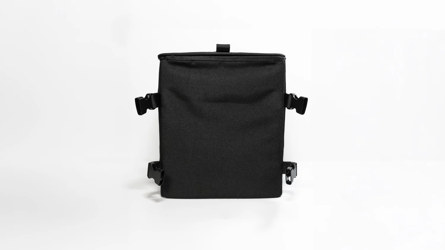 Rear view of the black Double Deez Goodz vehicle trash can against white, showing side attachment points, studio photography by Ian Jones of ISJDESIGNS.