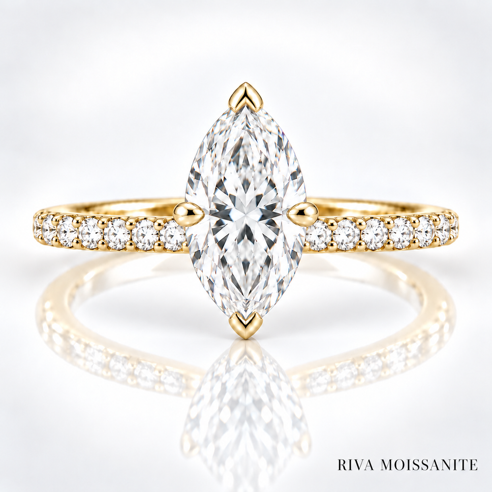 Marquise moissanite engagement ring with pavé band in yellow gold