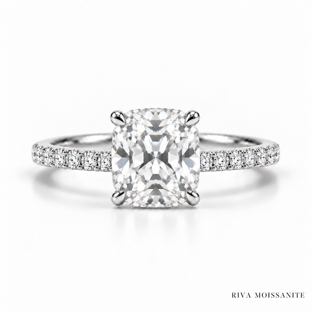 Cushion cut engagement ring with pavé band in white gold
