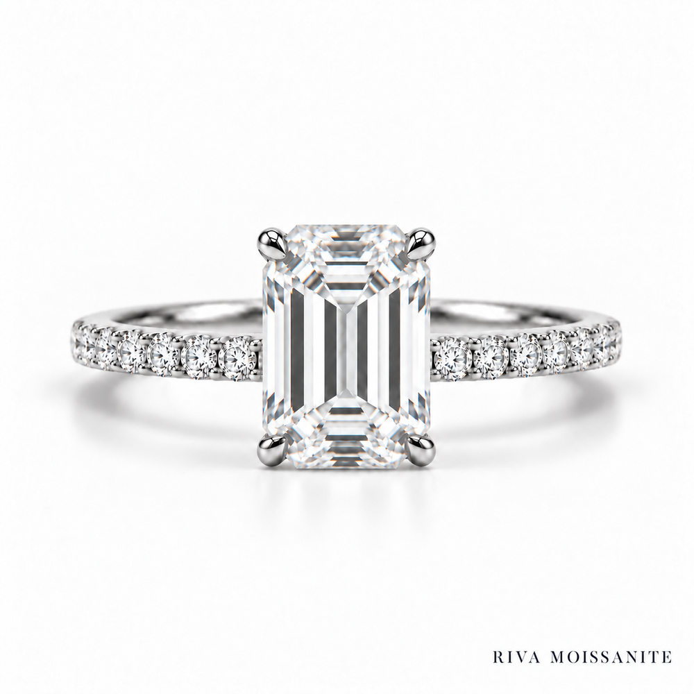 Emerald cut engagement ring with pavé band in white gold