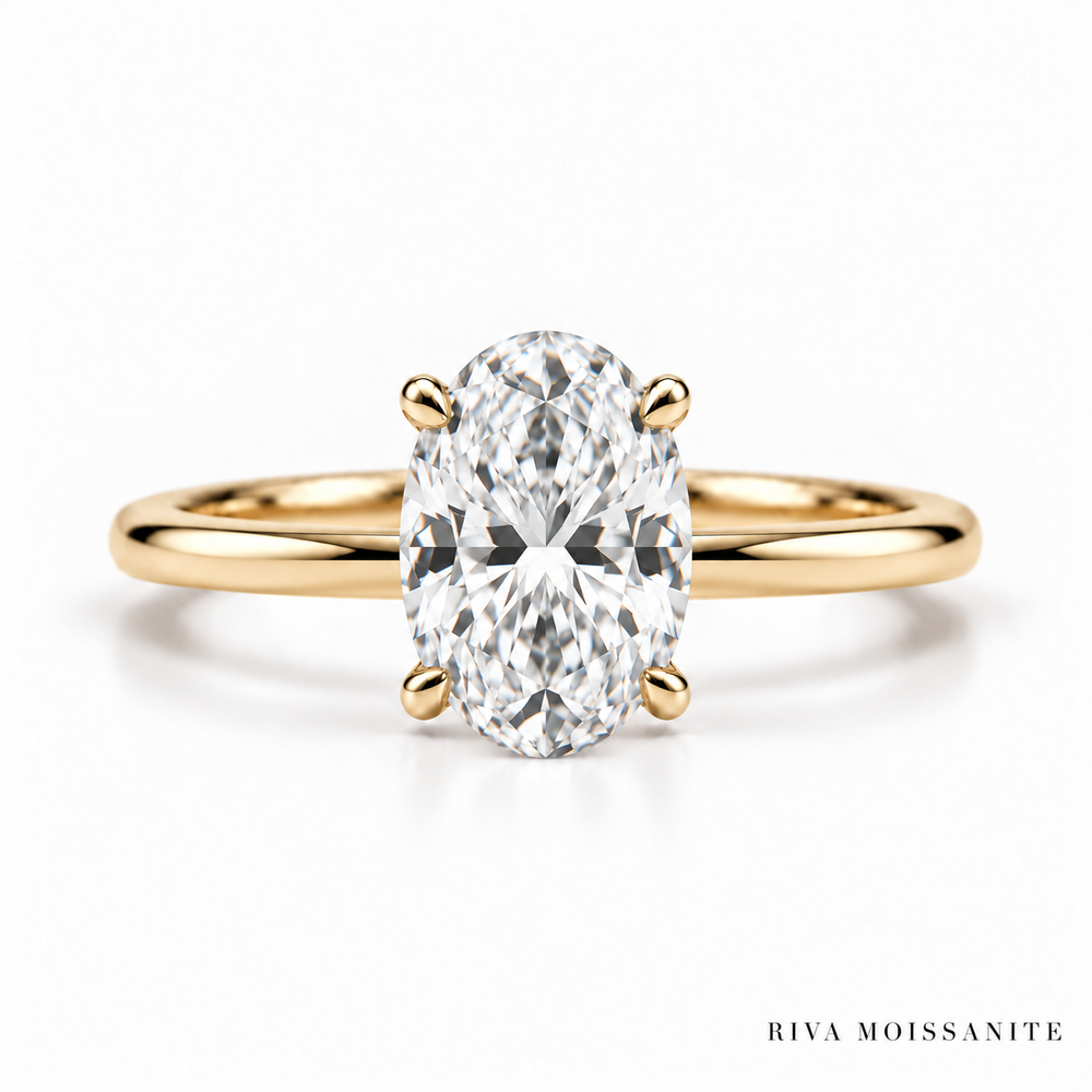 Oval solitaire engagement ring in yellow gold