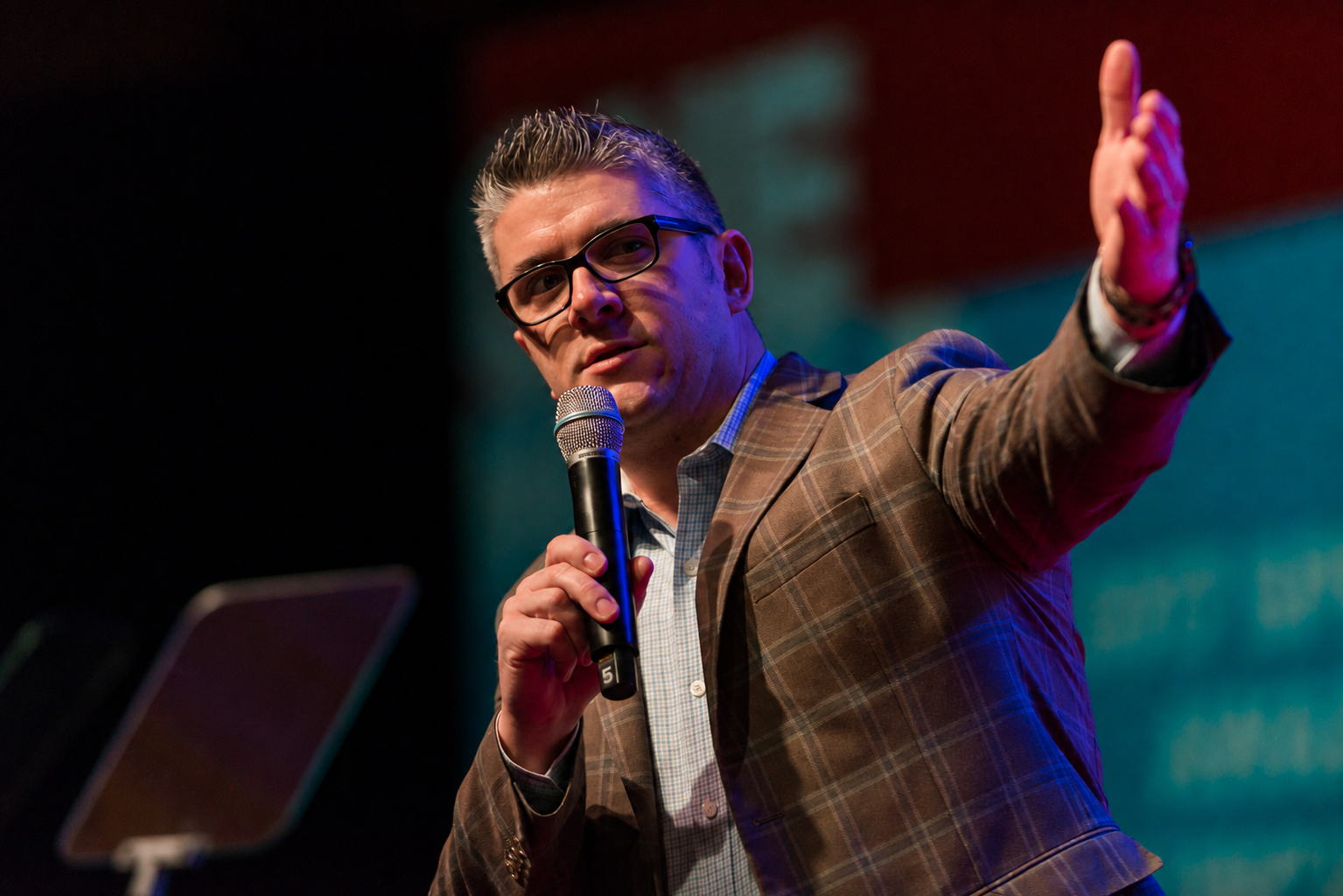 Josh Bolgren speaking on stage