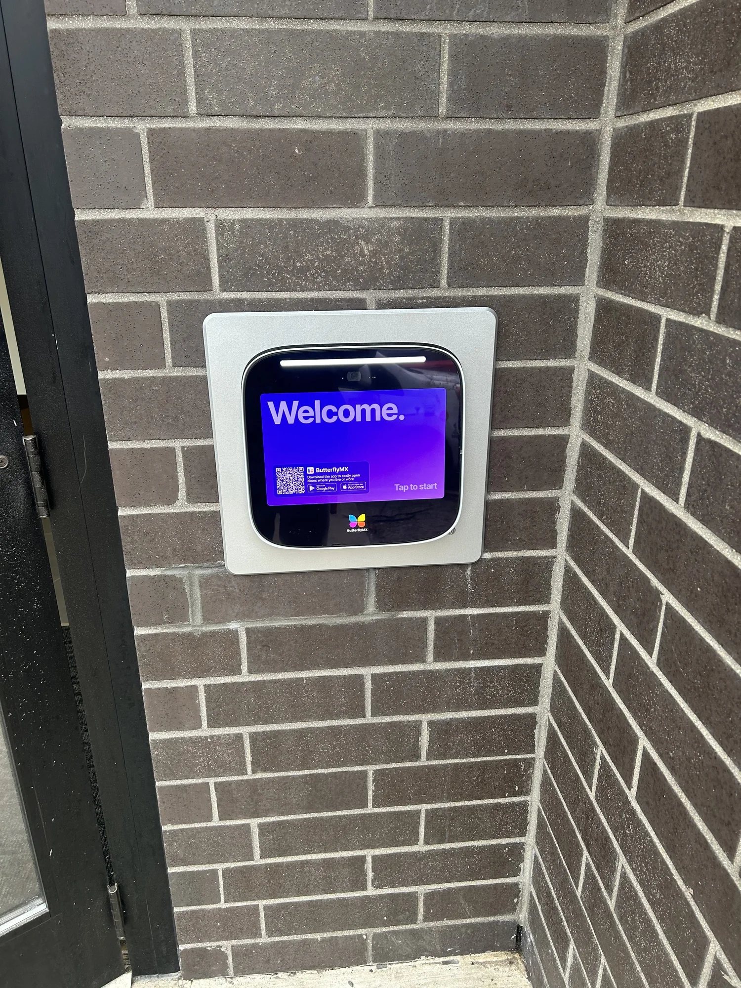 ButterflyMX video intercom and access control in a Chicago apartment lobby