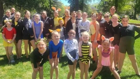 Company and competition team outdoors