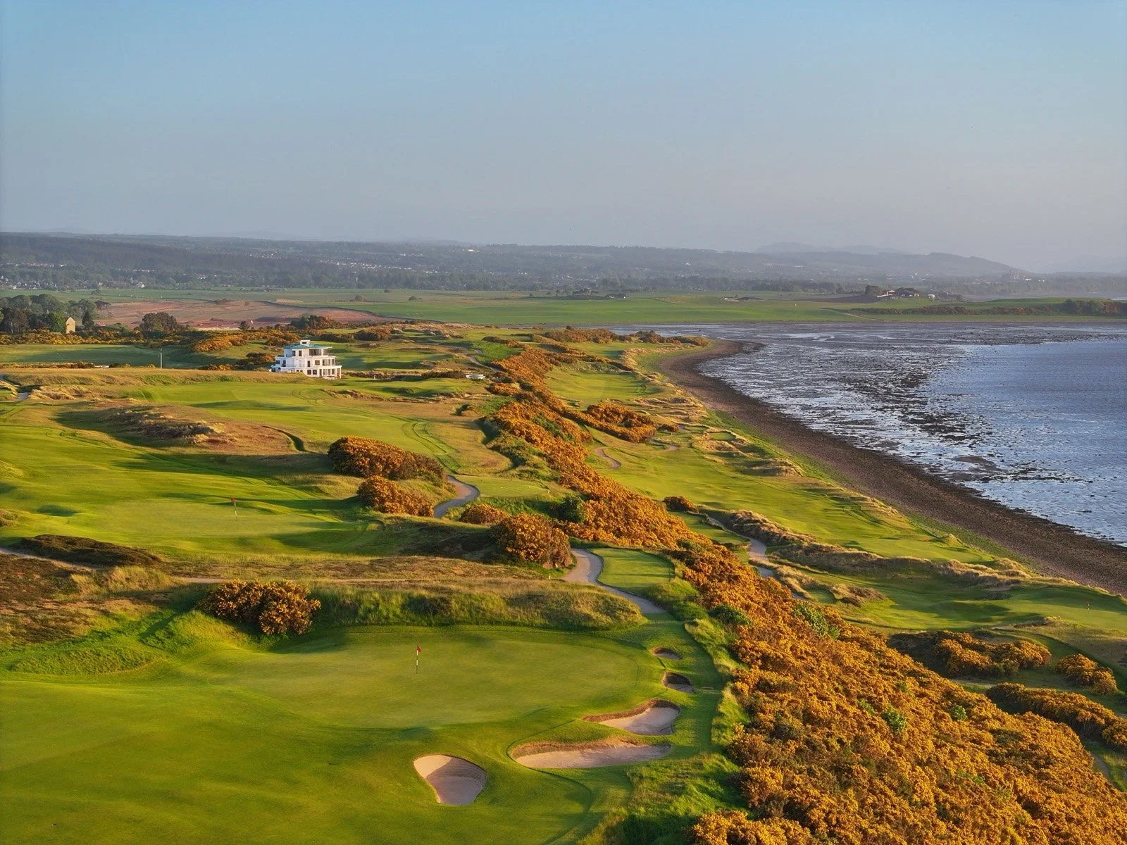 The old Highland links at Brora Golf Club stretching along the coast