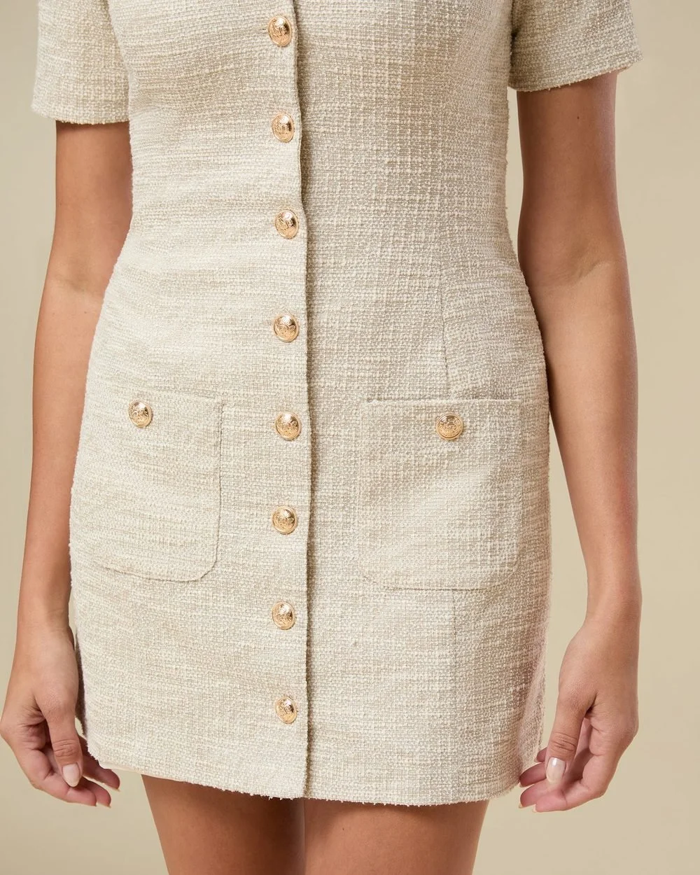 Cream dress on model